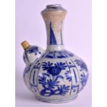 A 17TH CENTURY CHINESE BLUE AND WHITE KENDI painted with scattered flowers and motifs. 8.5ins high.