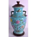 A LATE 19TH CENTURY CHINESE FAMILLE ROSE TWIN HANDLED VASE Late Qing, decorated in relief with