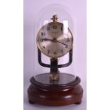 AN UNUSUAL EARLY 20TH CENTURY ELECTRO MAGNET TIME PIECE upon a circular mahogany base, with