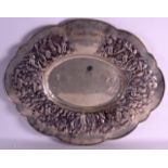 A RARE SWEDISH SILVER SCALLOPED OVAL TRAY by C G Hallberg, decorated in relief with hanging vines