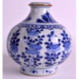 A 17TH CENTURY CHINESE BLUE AND WHITE GLOBULAR VASE painted with flowers and motifs. 5.5ins high.