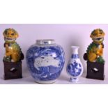 A 19TH CENTURY CHINESE BLUE AND WHITE SLENDER VASE together with a pair of sancai Buddhistic lions &