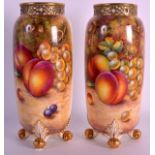 A FINE PAIR OF MID 20TH CENTURY ROYAL WORCESTER RETICULATED NECK VASES painted with fruit by John