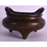 AN 18TH CENTURY CHINESE TWIN HANDLED BRONZE CENSER bearing Xuande marks to base, with high loop