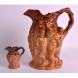 A 19TH CENTURY ENGLISH STONEWARE JUG decorated with classical figures in relief, together with a