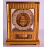 AN UNUSUAL JAEGER LE COULTRE BRASS ATMOS CLOCK. No. 66492. 9.25ins high.