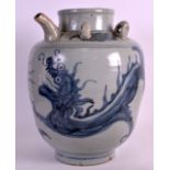 A 19TH CENTURY KOREAN BLUE AND WHITE POTTERY EWER painted with a stylised dragon. 12.5ins high.