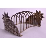 A RETRO 1960S SILVER PLATED 'STRAWBERRY' TOAST RACK with eight divisions. 8Ins wide.