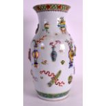 A MID 19TH CENTURY CHINESE PORCELAIN MOULDED VASE painted with precious objects under a floral