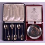 A SET OF SIX ENGLISH HALLMARKED SILVER SPOONS together with a silver Churchill coin dish. (2)