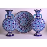 A PAIR OF PERSIAN SAFAVID TYPE TWIN HANDLED VASES together with a matching dish, painted with