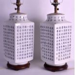 A PAIR OF MODERN CHINESE SQUARE FORM LAMPS painted with calligraphy, together with a celadon jar. (