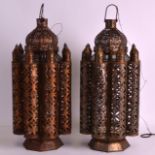 A PAIR OF ISLAMIC STYLE OCTAGONAL HANGING LANTERNS. 1Ft 8ins high.