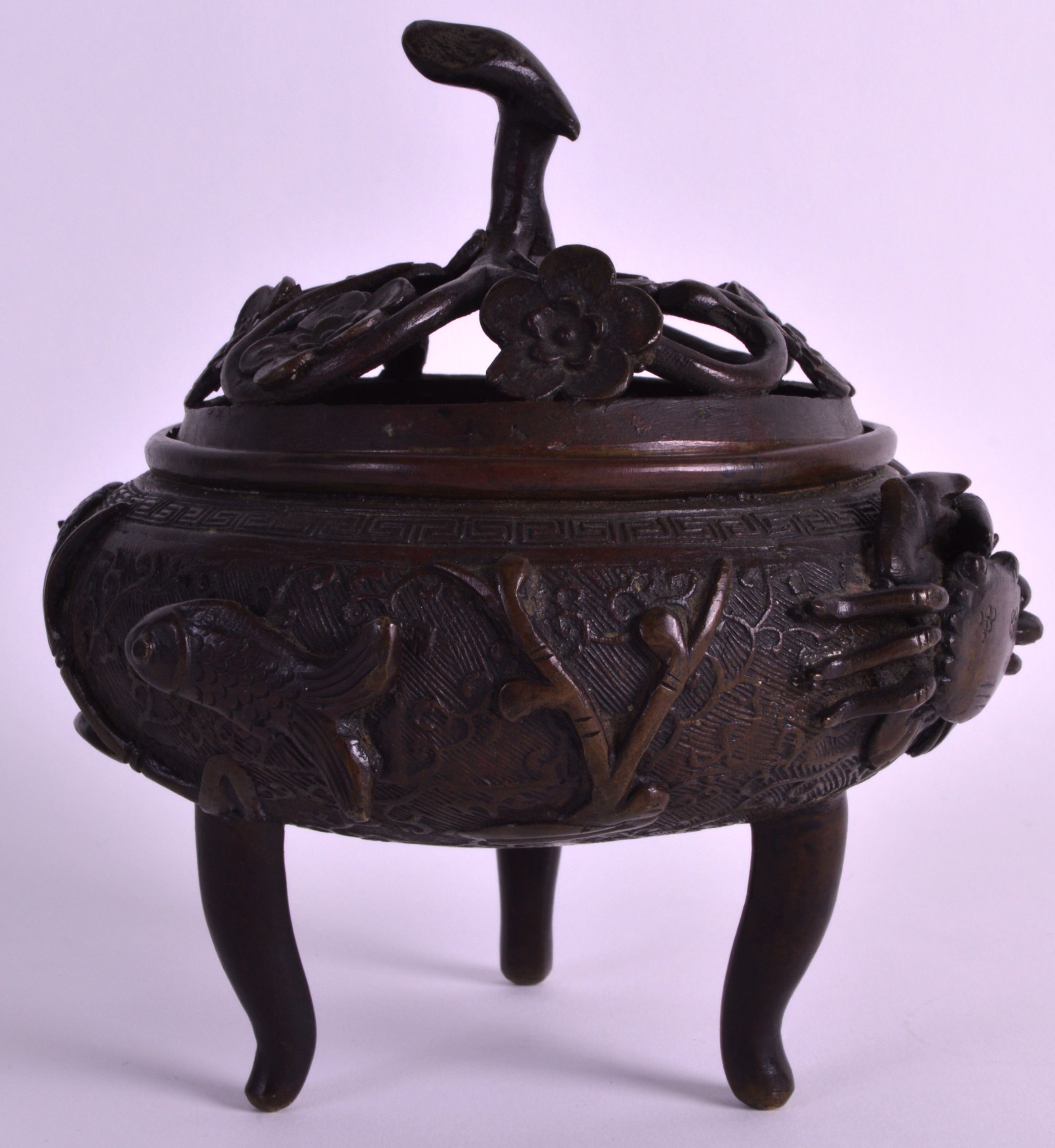 A 19TH CENTURY CHINESE BRONZE CENSER AND COVER overlaid with crustaceans and fish. 5.75ins wide.