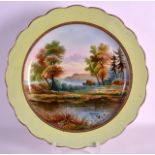 A MID 19TH CENTURY ENGLISH POTTERY CHARGER painted with a coastal landscape by Thomas. 1Ft 3ins