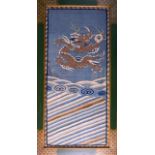 A 19TH CENTURY CHINESE FRAMED SILK KESI PANEL depicting a five claw dragon clutching a flaming pearl