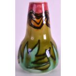 A MINTON SECESSIONIST ART NOUVEAU VASE No.12, painted with foliage on a green ground. 5.5ins high,