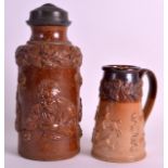 A 19TH CENTURY ENGLISH STONEWARE TOBACCO JAR together with a smaller stoneware shaving mug. 9Ins &