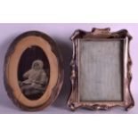 AN ART NOUVEAU SILVER PHOTOGRAPH FRAME together with another oval silver photograph frame. Both 5.