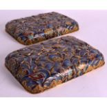 A PAIR OF CHINESE QING DYNASTY CLOISONNE ENAMEL RECTANGULAR RESTS decorated all over with flowers