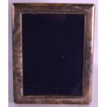 AN ENGLISH SILVER HALLMARKED PHOTOGRAPH FRAME by Mappin & Webb. 9.25ins x 6.75ins.