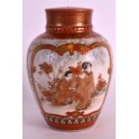 A 19TH CENTURY JAPANESE KUTANI PORCELAIN TEA CADDY AND COVER painted with figures within a