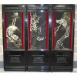 AN EARLY 20TH CENTURY JAPANESE MEIJI PERIOD BLACK LACQUER AND EMBROIDERED SCREEN painted with cranes