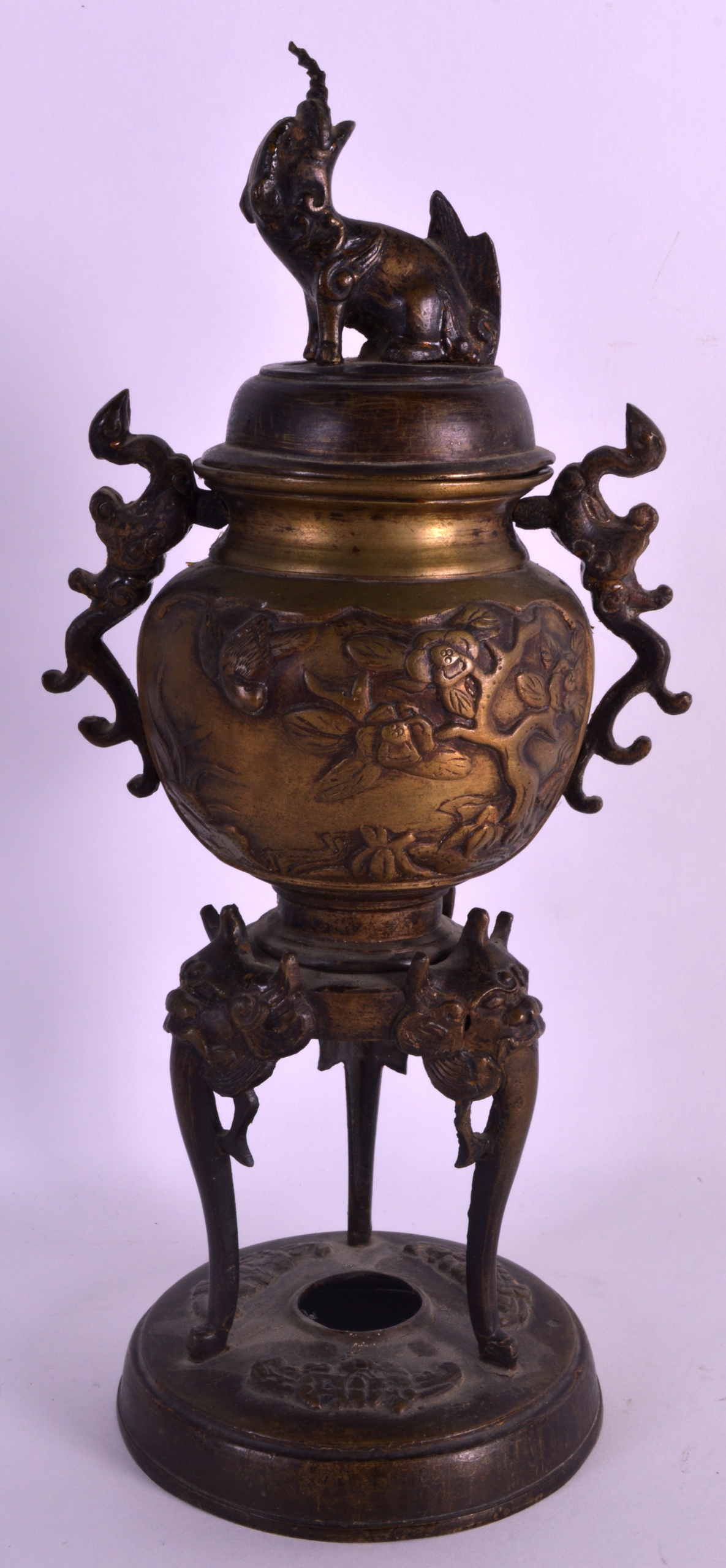 A 19TH CENTURY JAPANESE MEIJI PERIOD BRONZE CENSER AND COVER decorated with foliage. 11.5ins high.