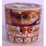 AN EARLY 19TH CENTURY COALPORT DRUM SHAPED INKWELL painted with an imari style pattern. 2.75ins