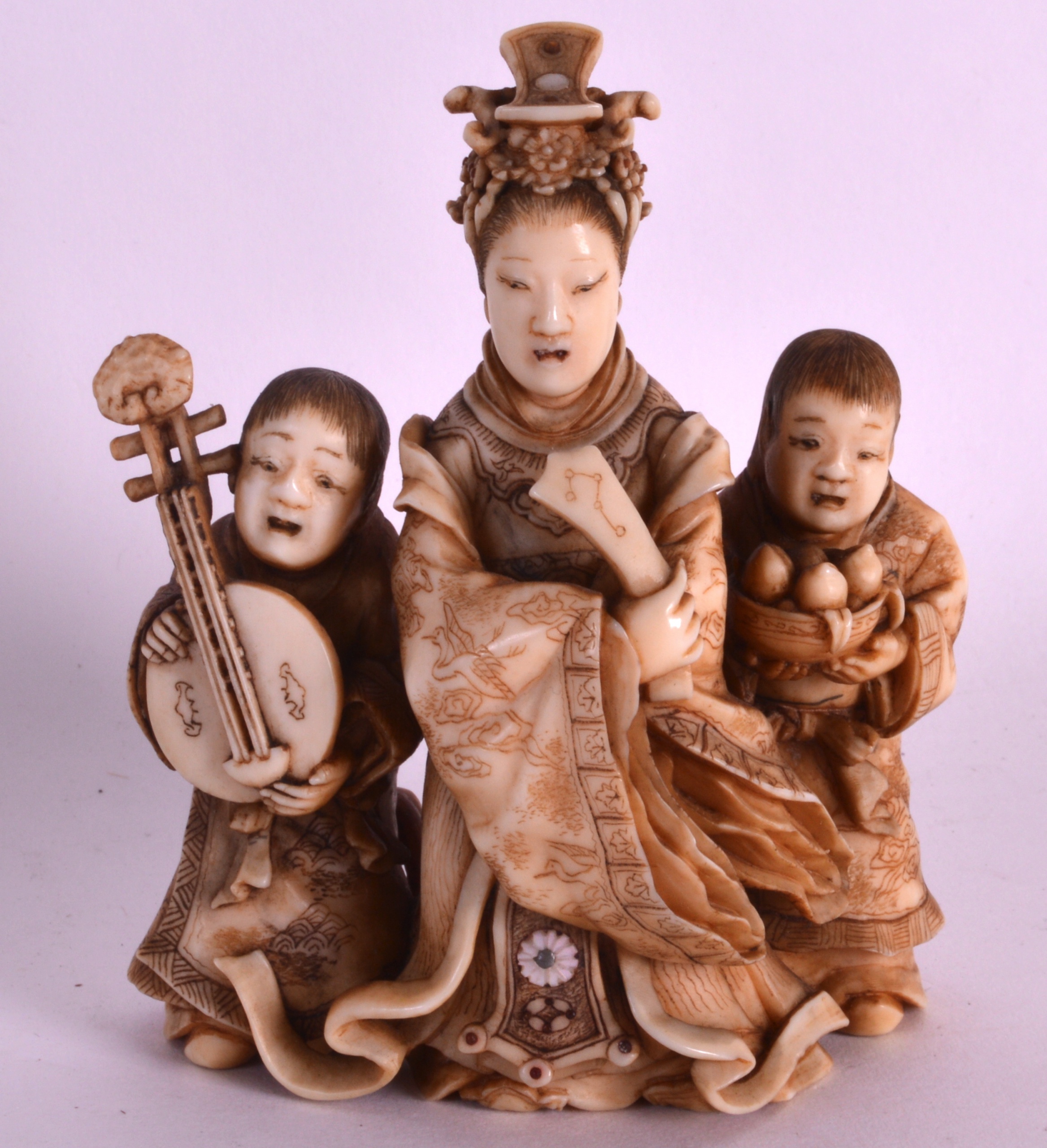 A LOVELY 19TH CENTURY JAPANESE MEIJI PERIOD CARVED IVORY OKIMONO modelled as a mother and children