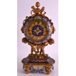 A FINE 19TH CENTURY FRENCH OROMOLU AND CHAMPLEVE ENAMEL MANTEL CLOCK of drum shape supported by