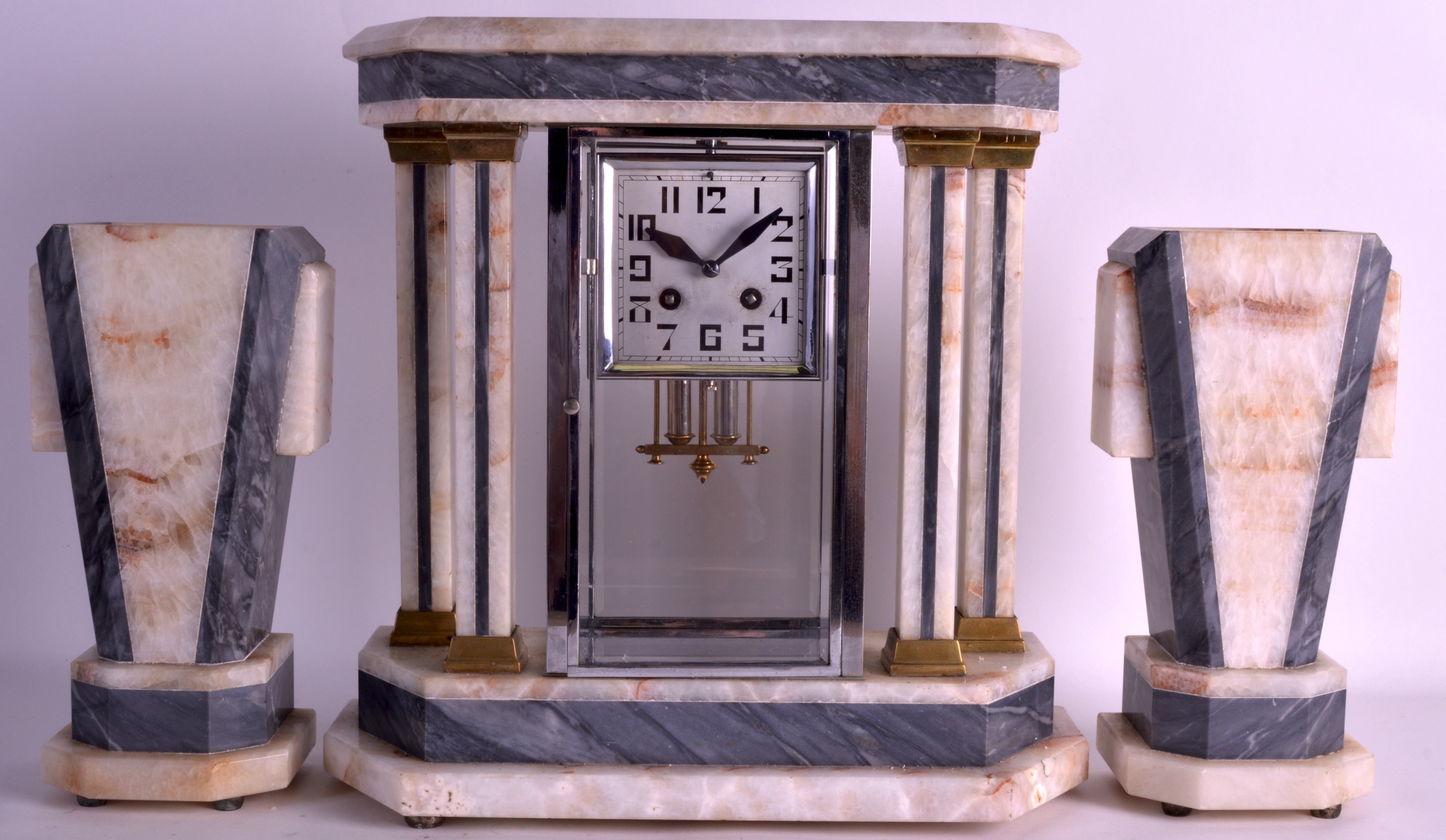 A FRENCH ART DECO CLOCK GARNITURE with square dial and bold numerals. Clock 1ft 4ins high. (3)