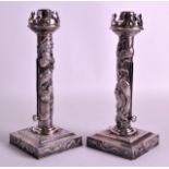 A RARE PAIR OF LATE 19TH CENTURY JAPANESE MEIJI PERIOD SILVER TELESCOPIC CANDLESTICKS decorated in