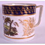 AN EARLY 19TH CENTURY DERBY PORTER MUG painted with a landscape, gilded with floral sprays between