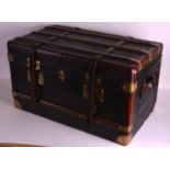 A LOVELY EARLY 20TH CENTURY LEATHER AND BRASS BOUND TRUNK with fittings by HB Brevetes (Louis