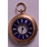 A 14CT YELLOW GOLD AND ENAMEL HALF HUNTER FOB WATCH. 1.5ins diameter.