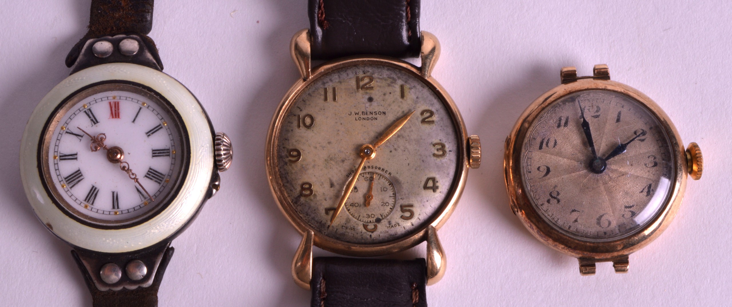 A 1950S 9CT YELLOW GOLD J W BENSON WRISTWATCH together with another gold watch & a silver and enamel