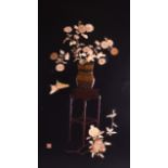 A LATE 19TH CENTURY JAPANESE MEIJI PERIOD BLACK LACQUER PANEL decorated with foliage and urns of