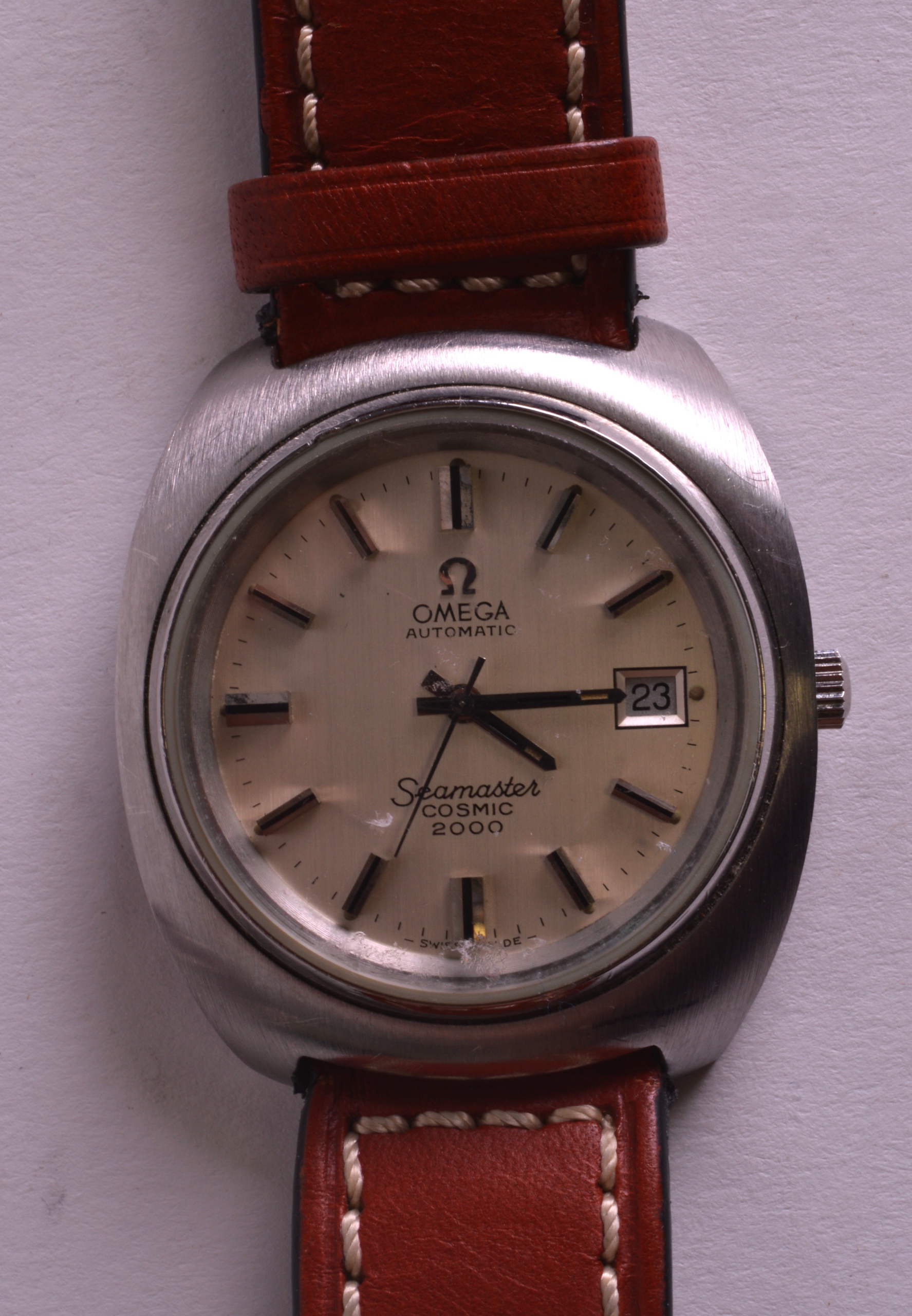 A 1970S OMEGA AUTOMATIC SEAMASTER COSMIC 2000 with brown leather strap. 1.5ins wide.