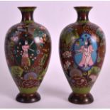 A PAIR OF EARLY 20TH CENTURY JAPANESE MEIJI PERIOD CLOISONNE ENAMEL VASES decorated with figures and