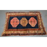 AN EARLY 20TH CENTURY AFGHAN RUG. A/F.