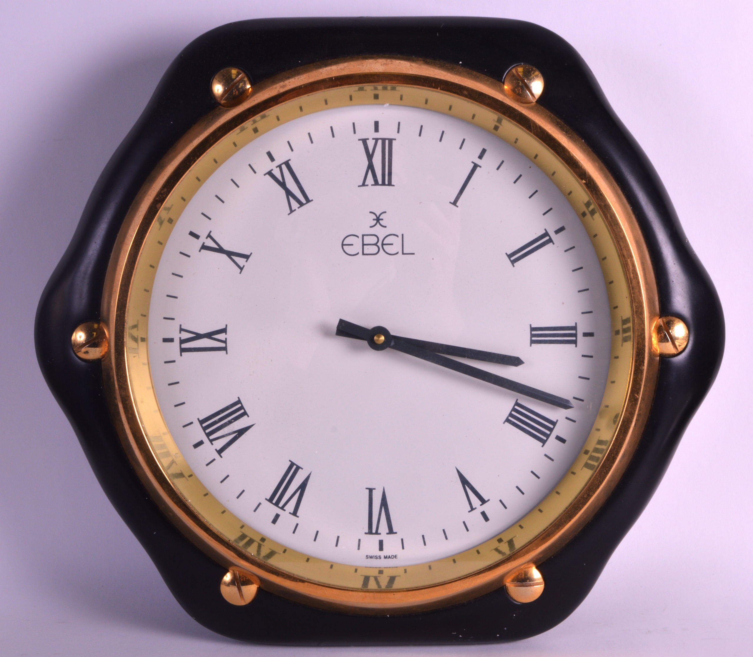 AN UNUSUAL HEAVY CAST ALUMINIUM 'EBEL' WATCHES SHOP DISPLAY CLOCK. 16.5ins wide.