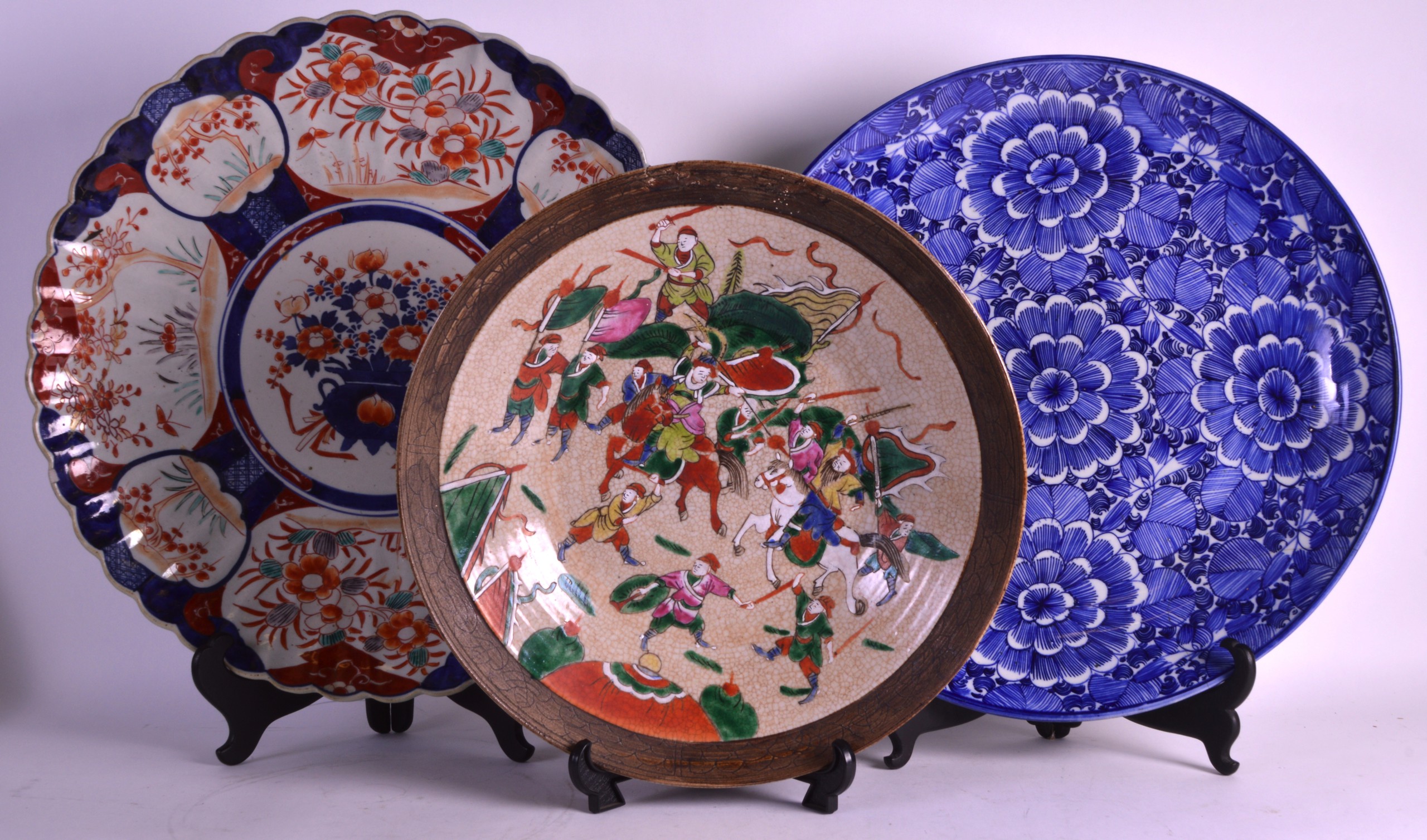 A LARGE 19TH CENTURY JAPANESE MEIJI PERIOD CHARGER together with two other chargers. Largest 1ft