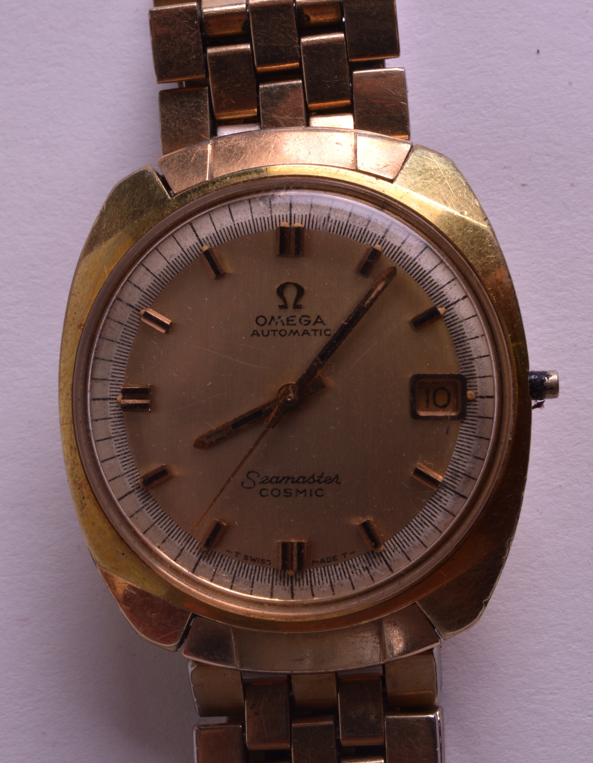 A 1970S OMEGA GOLD PLATED GENTLEMANS AUTOMATIC WRISTWATCH together with box and paperwork dated
