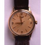 A 1950S GENTLEMANS 9CT YELLOW GOLD LONGINES WRISTWATCH.