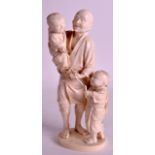 A GOOD 19TH CENTURY JAPANESE MEIJI PERIOD TOKYO SCHOOL OKIMONO depicting a father and two sons