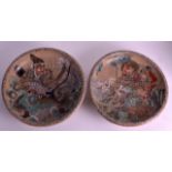 A PAIR OF LATE 19TH CENTURY JAPANESE MEIJI PERIOD SATSUMA CHARGERS decorated with figures and beasts