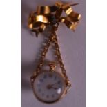 AN EDWARDIAN LADIES GOLD REVERSE FOB WATCH carved with an Essex crystal flower.