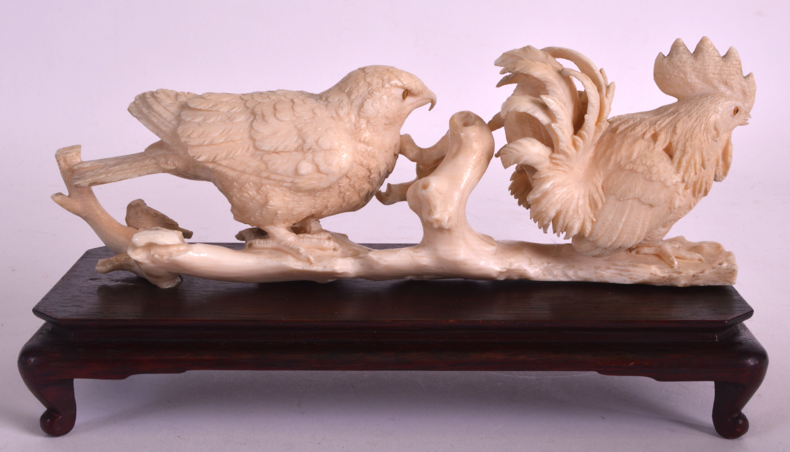 A 19TH CENTURY JAPANESE MEIJI PERIOD CARVED IVORY OKIMONO modelled as a game bird  standing behind a - Image 2 of 3