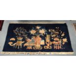 AN EARLY 20TH CENTURY ART DECO PEKING PICTORIAL RUG. 5Ft 2ins x 3ft 2ins.